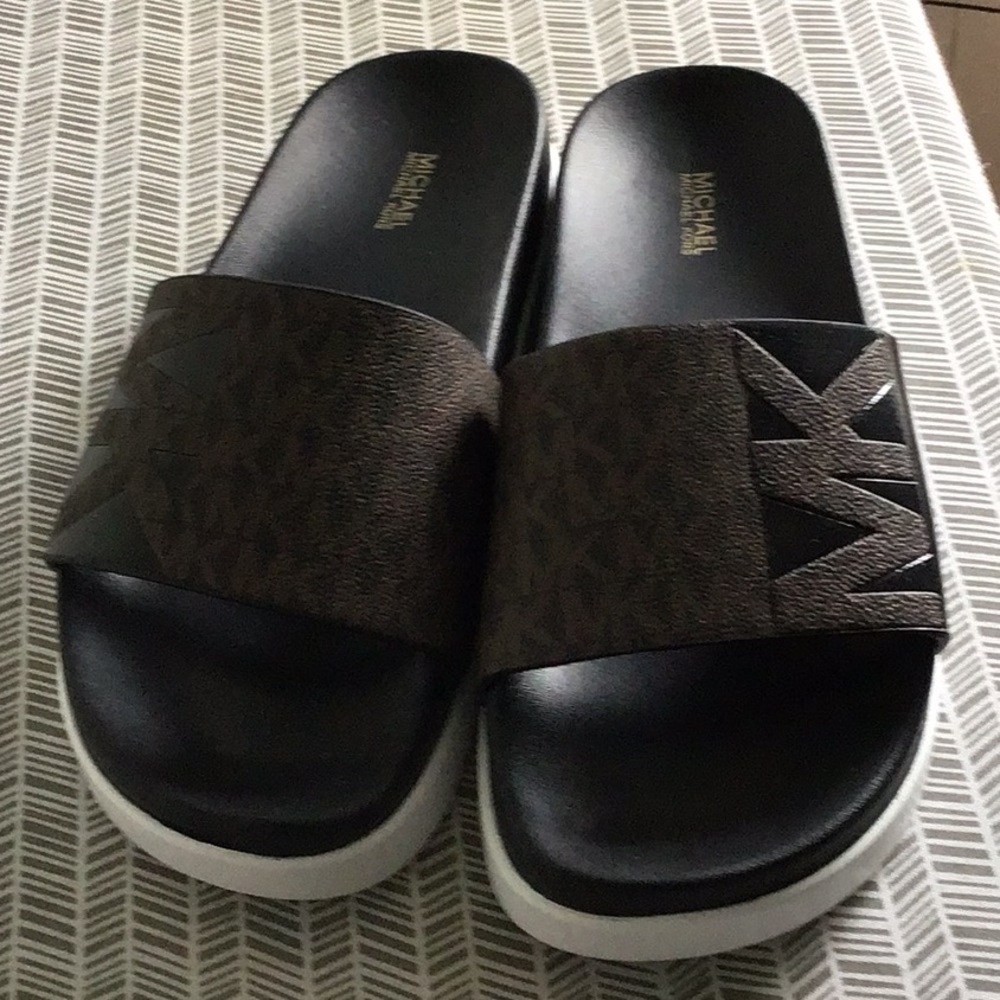 New never worn in box Michael Kors slides
